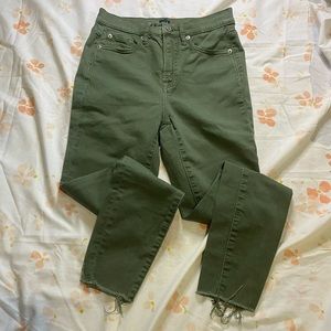 Green cut bottom skinny jeans